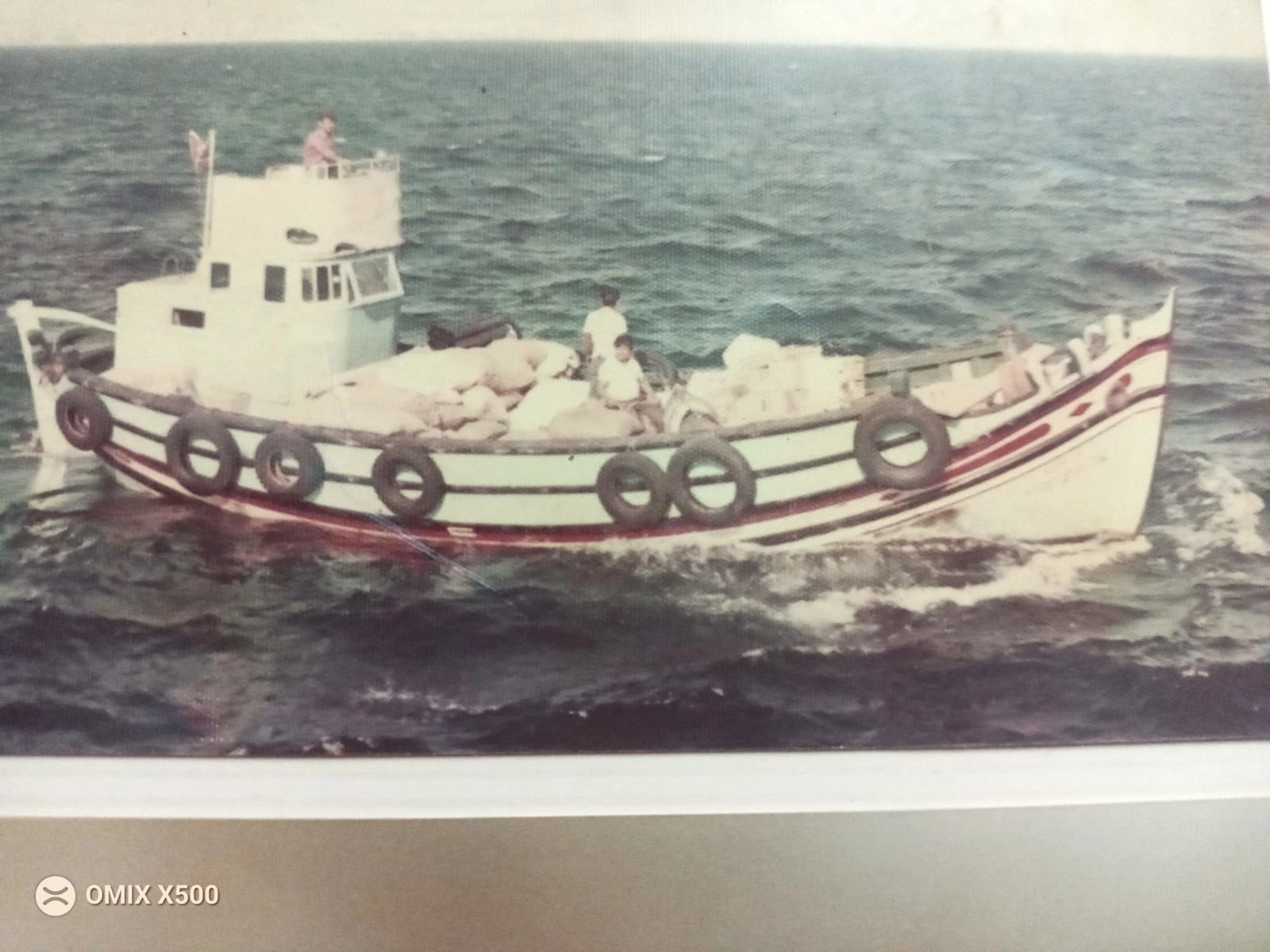 A tugboat sailing in the water